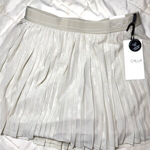CALIA by Carrie Underwood Pleated Cream Mini tennis skirt